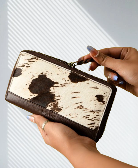 Leather front cow print zip around clutch purse