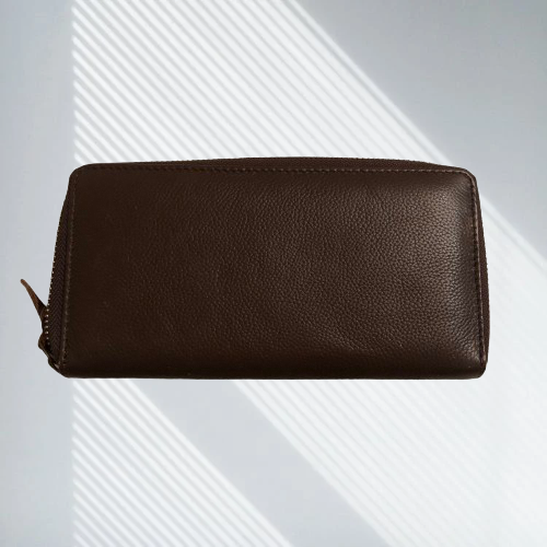 Leather front cow print zip around clutch purse